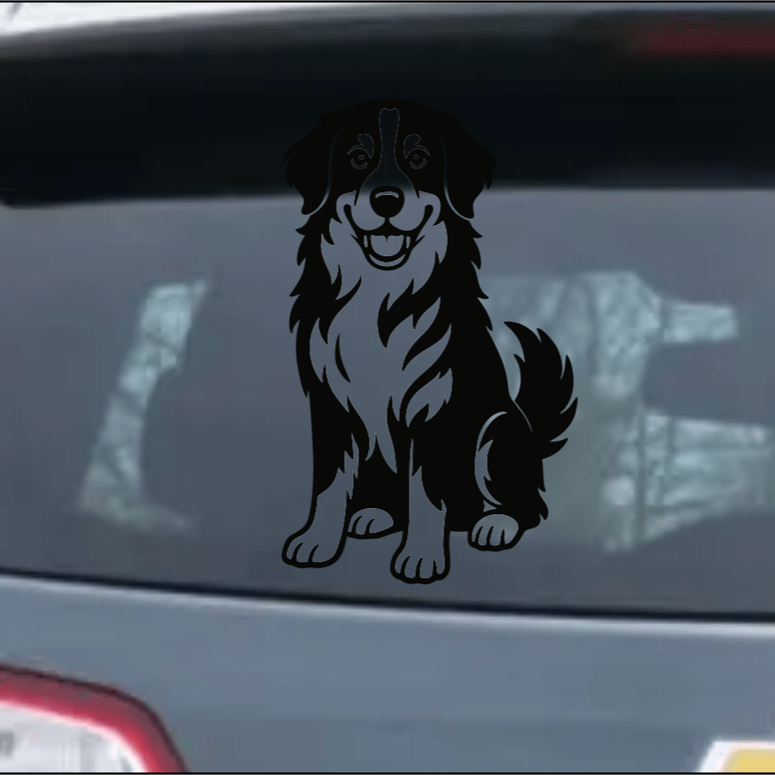 Bernese Mountain Dog decal on a car window with a blurred background