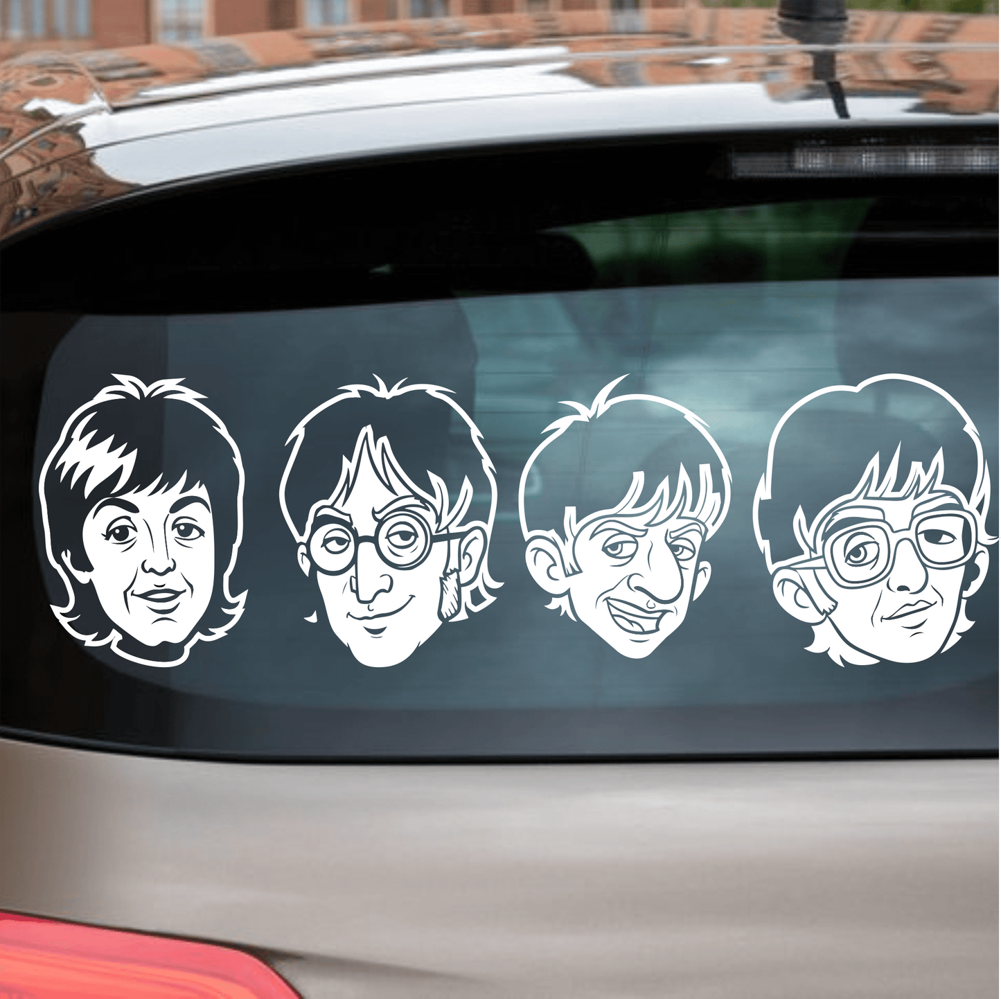 Car window with four white Beatles-style face decals.