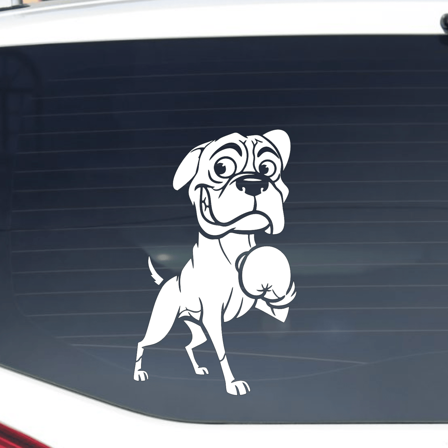 Car window with a white Boxer dog decal on a black background