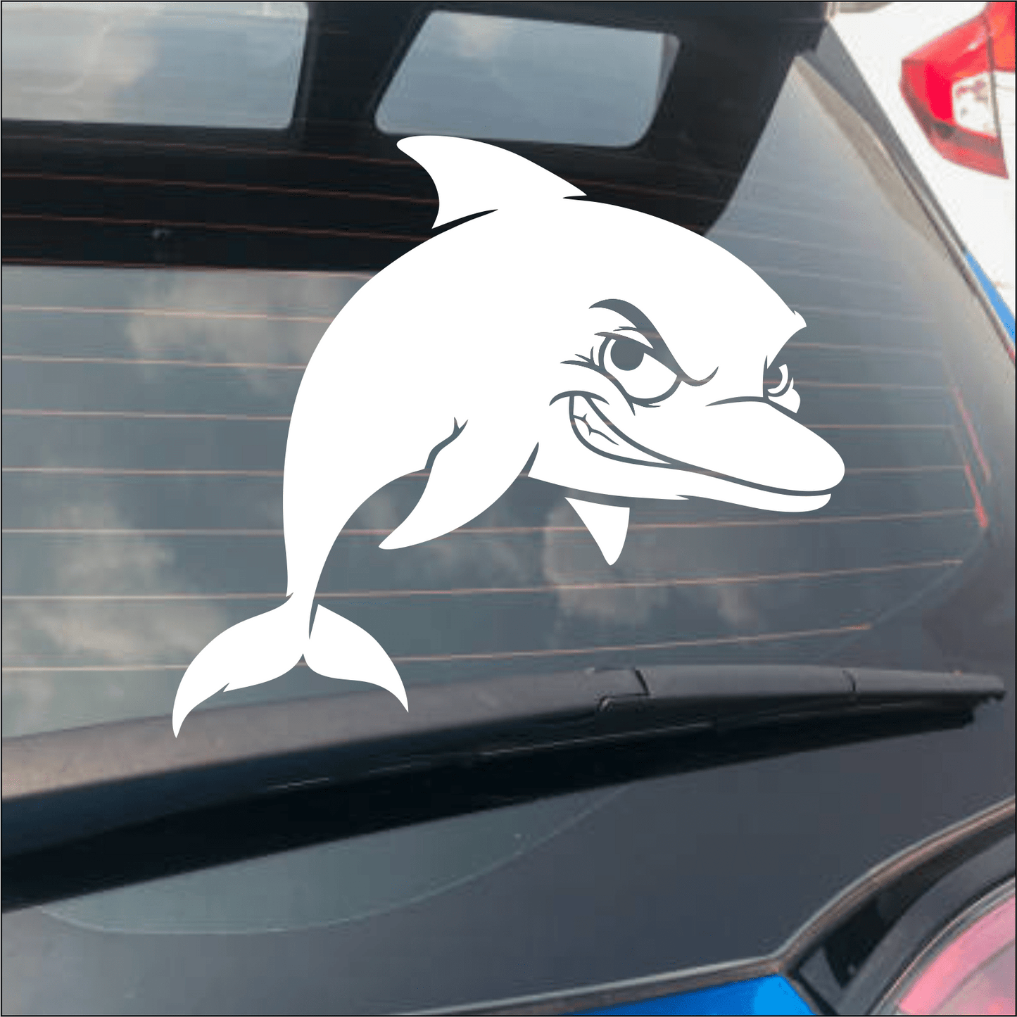 White dolphin decal on a car window