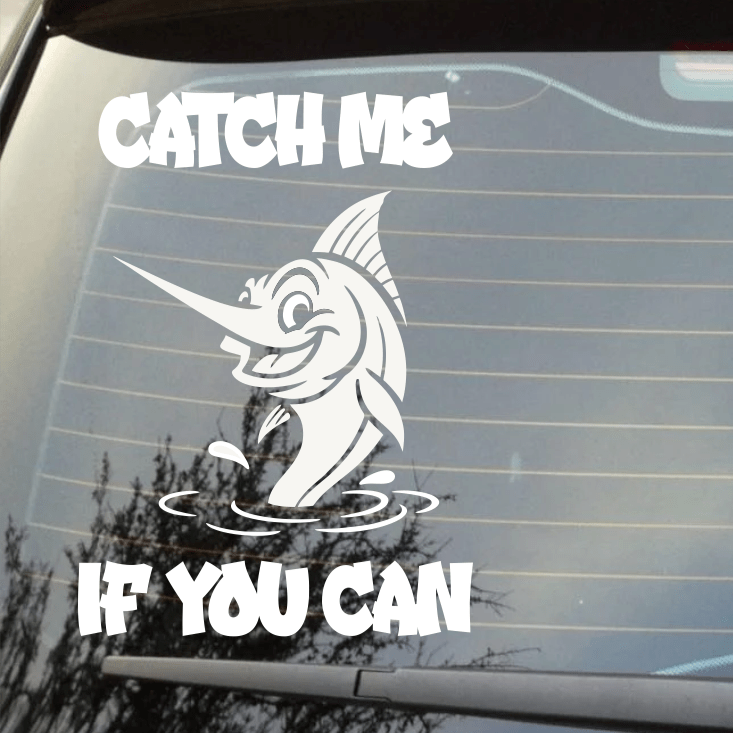Car window with a humorous fishing decal and text 'Catch Me If You Can'.