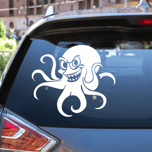 White octopus decal on a car's rear window with a cityscape background