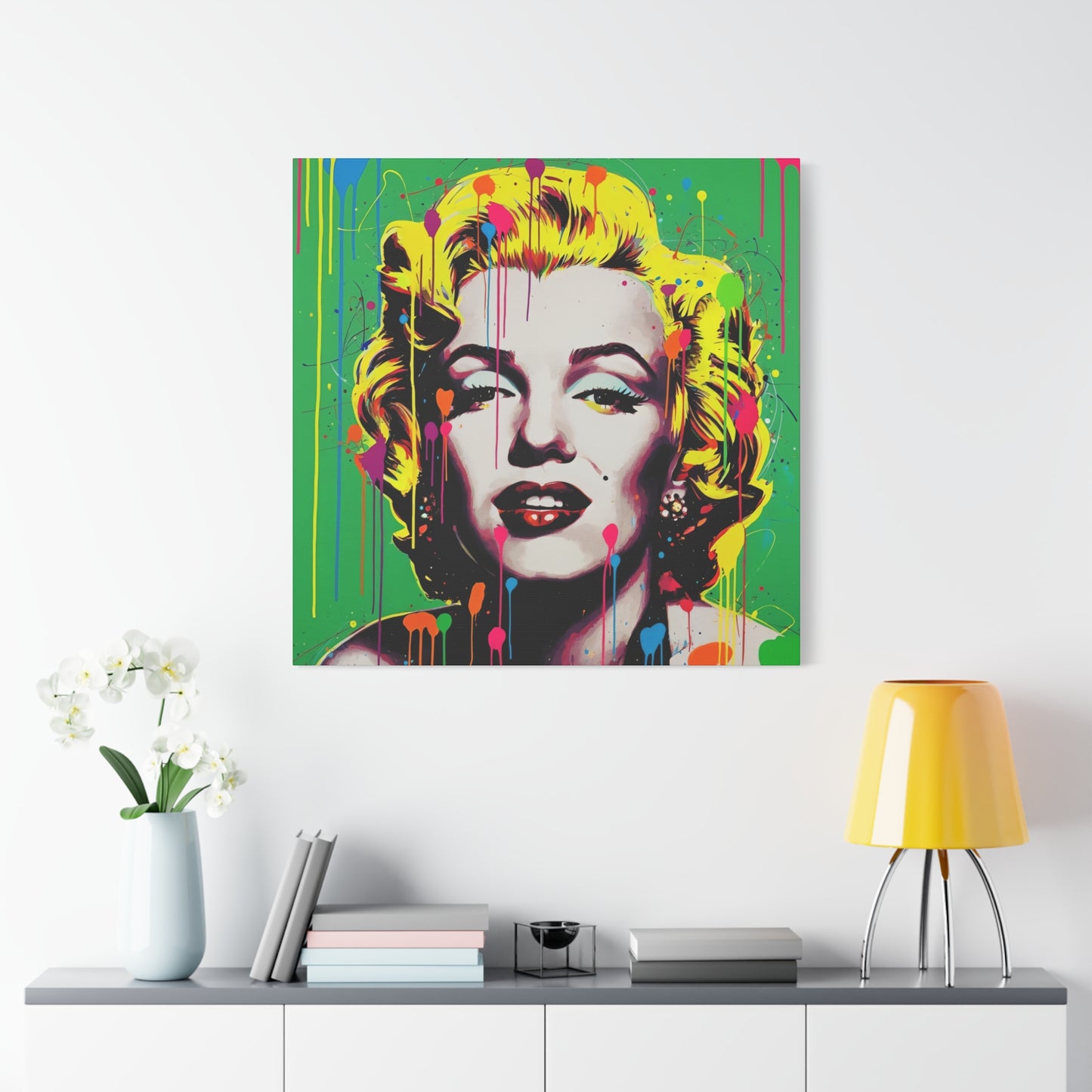 Colorful abstract painting of a famous actress on a wall above a shelf with decor items.