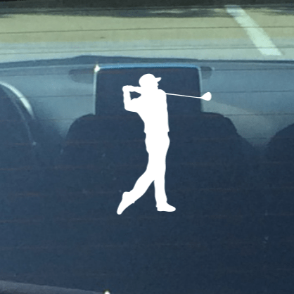 Silhouette of a golfer on a car window