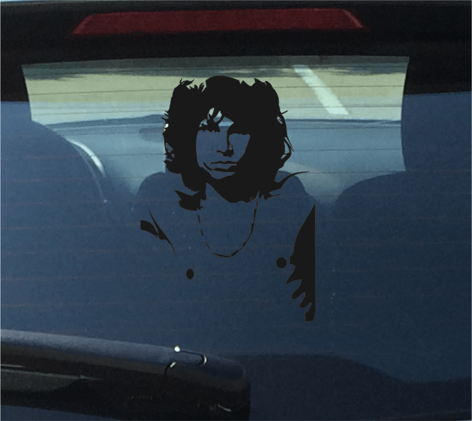 Car window with a black silhouette decal of Jim Morrison