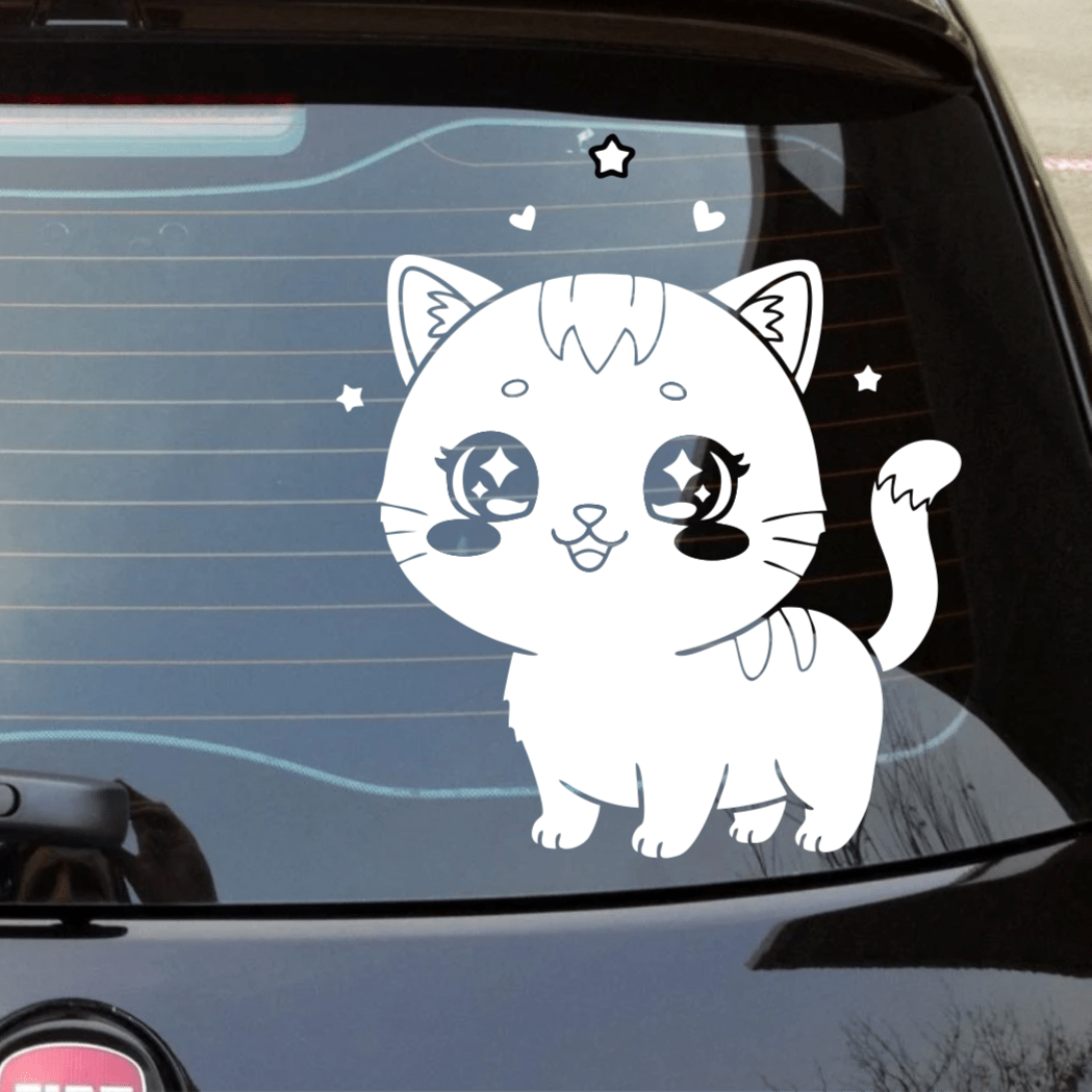 Cartoon cat decal on a car window with a city street reflection.