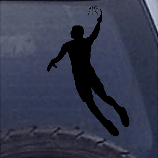 Black silhouette of a basketball player in mid-air with a basketball on a textured blue background