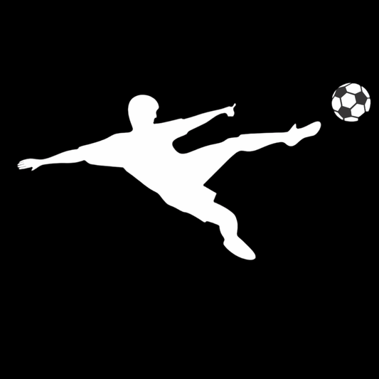 White silhouette of a soccer player kicking a ball on a black background