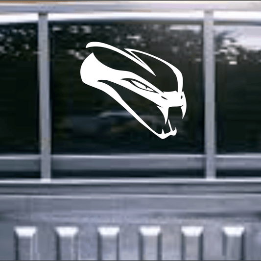 Car window with a white decal of a vehicle on a black background