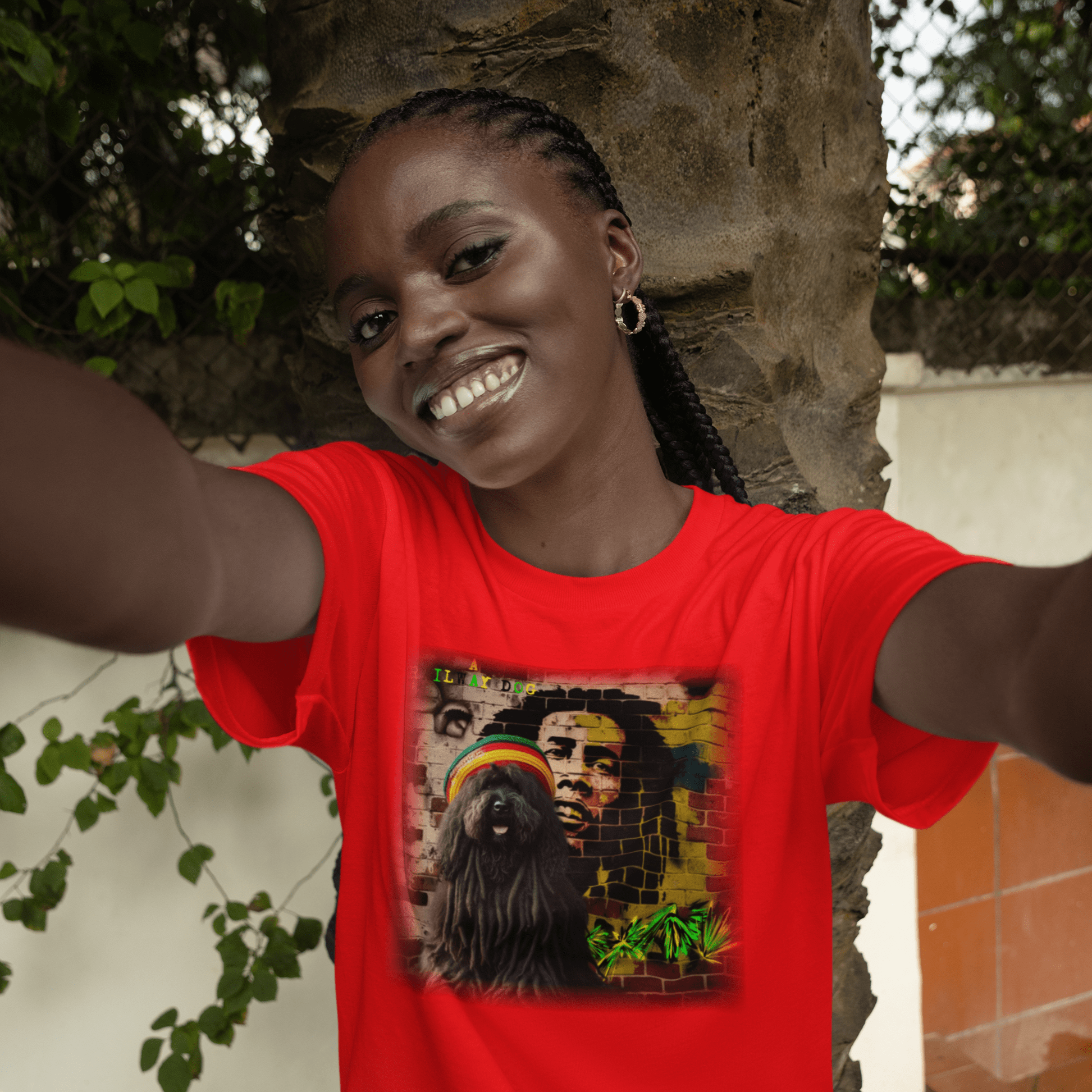 T-shirt featuring a Puli dog and Bob Marley, a reggae legend.