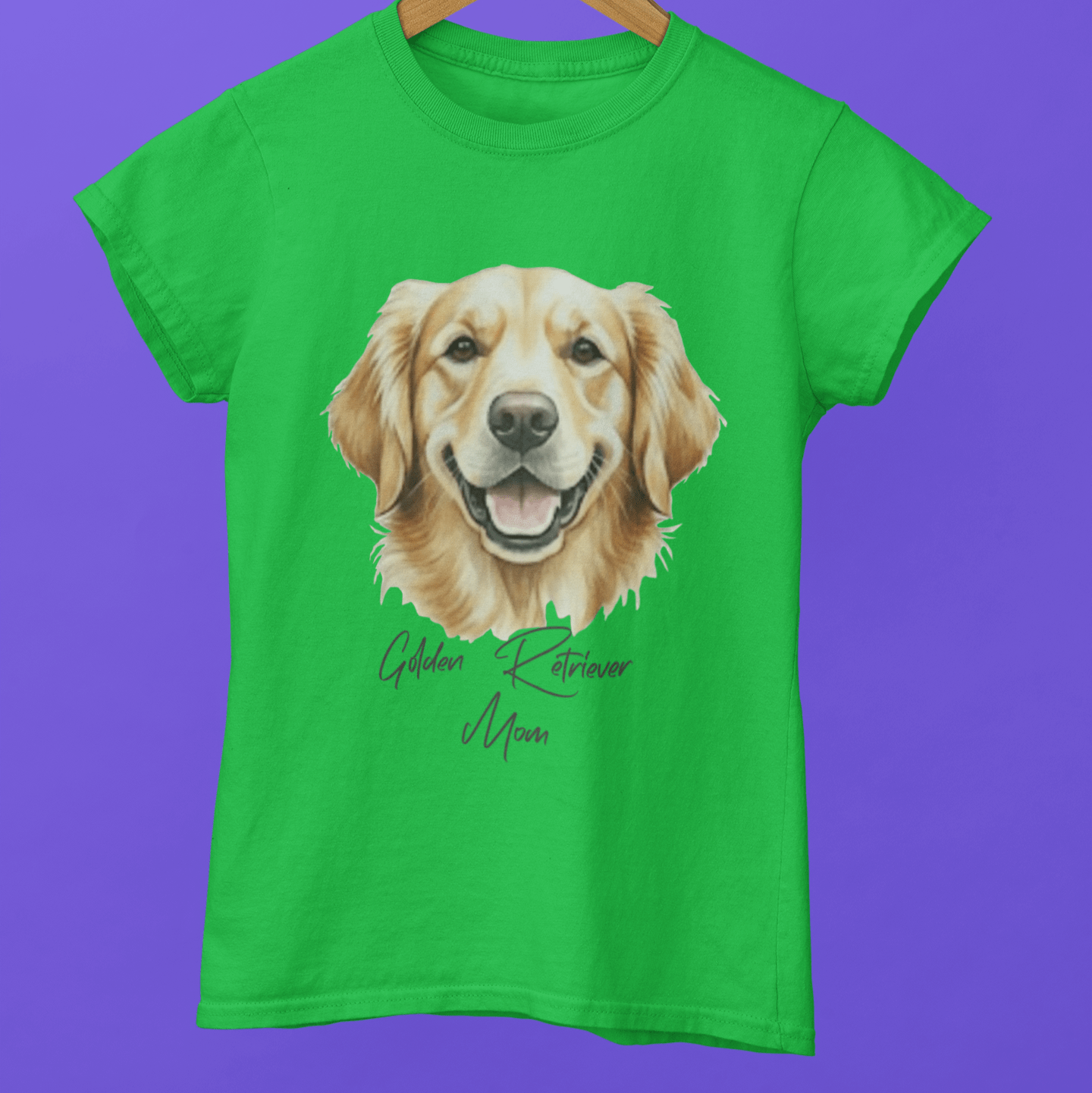 Green t-shirt with a Golden Retriever illustration on a hanger against a purple background