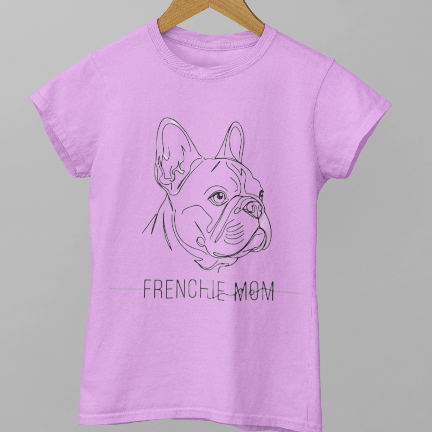 Purple t-shirt with a dog illustration and 'FRENCHIE MOM' text on a gray background