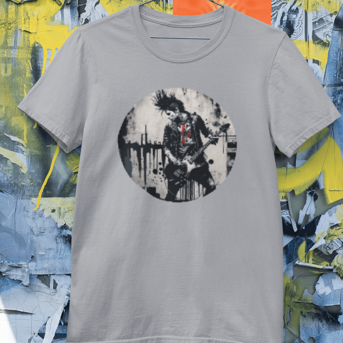 A graphic tee with an image of a punk rock guitarist shredding on stage