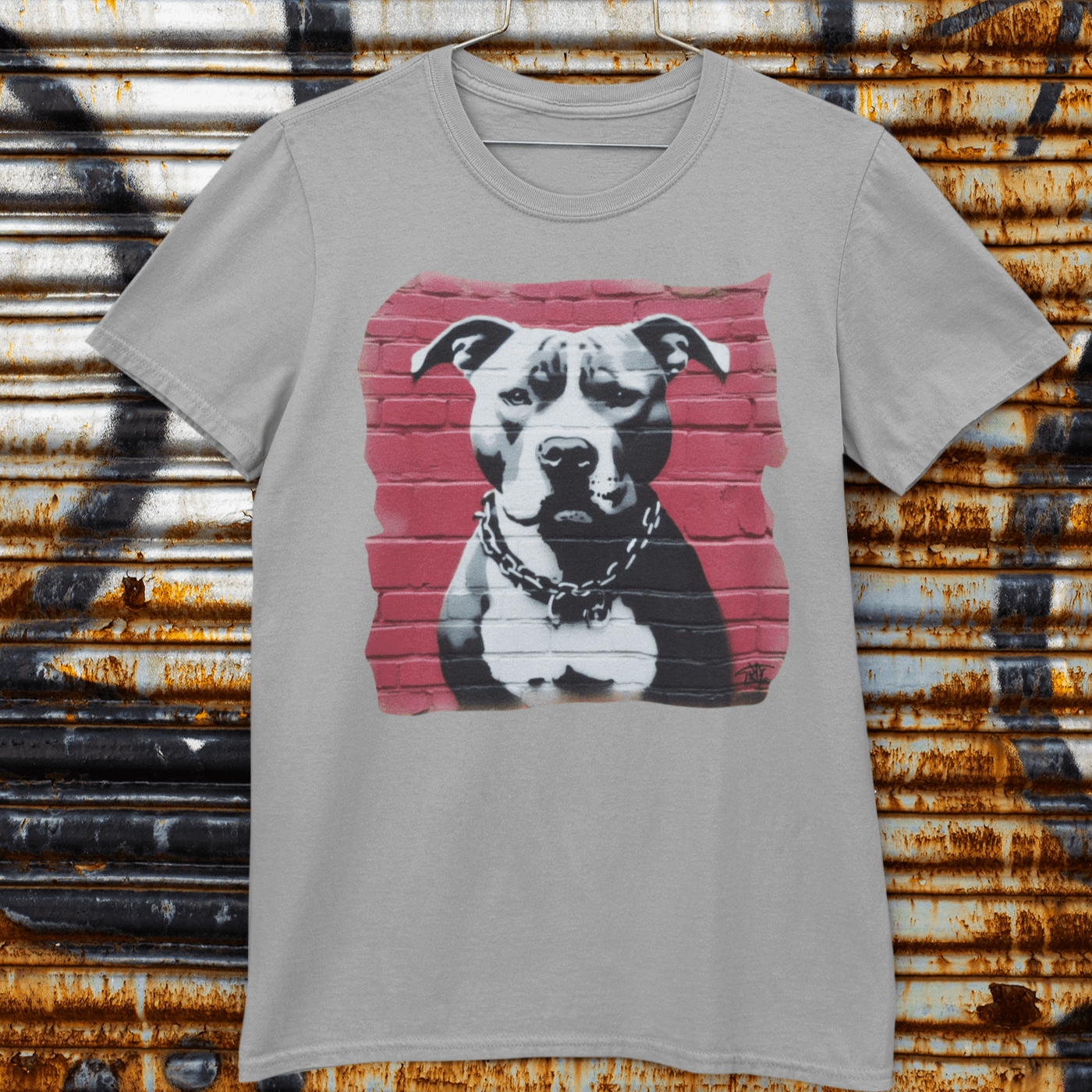 Graphic T-shirt featuring a Pitbull Terrier, showcasing a bold and artistic design that highlights the breed's strong and loyal characteristics.