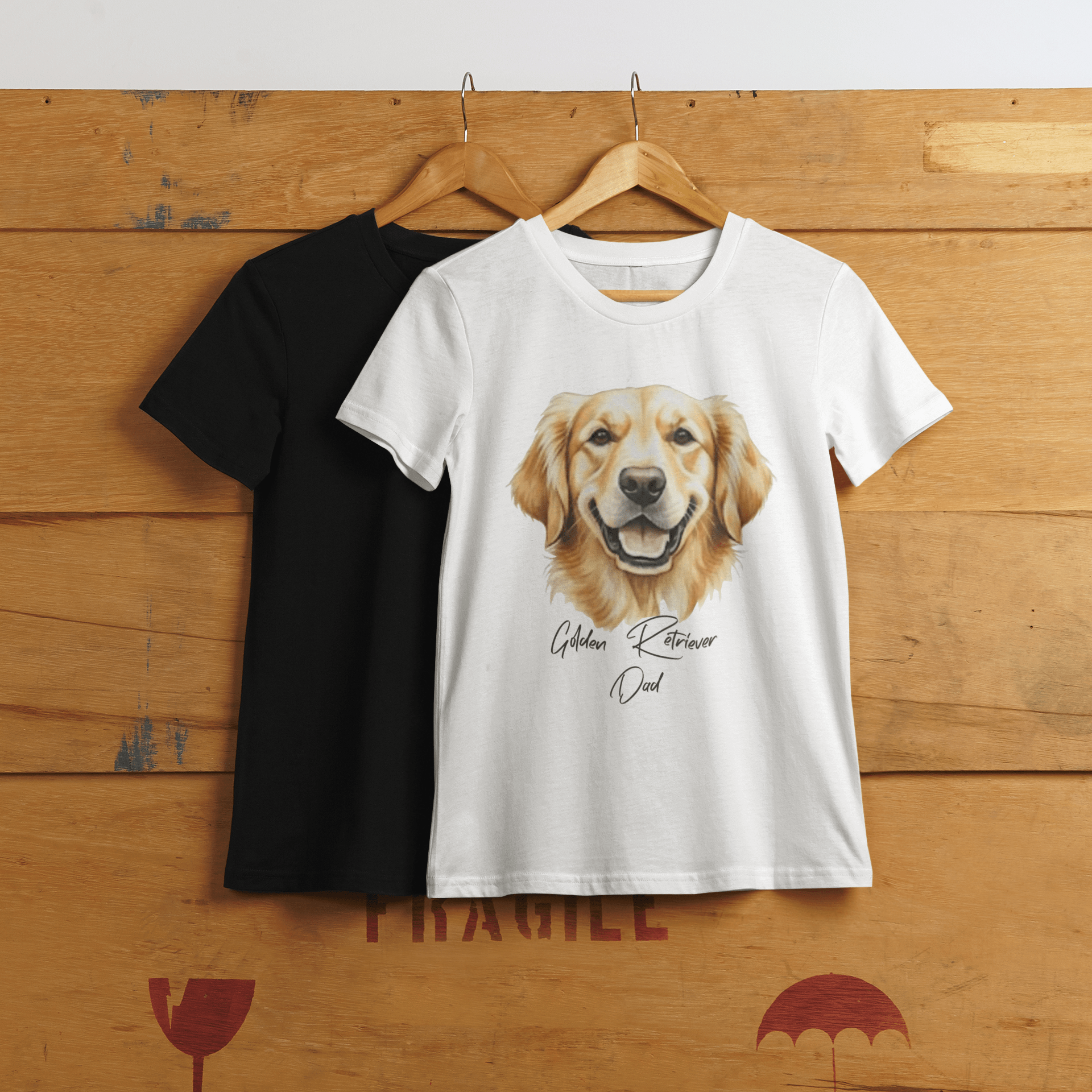 Black and white t-shirts with a Golden Retriever design on a wooden background