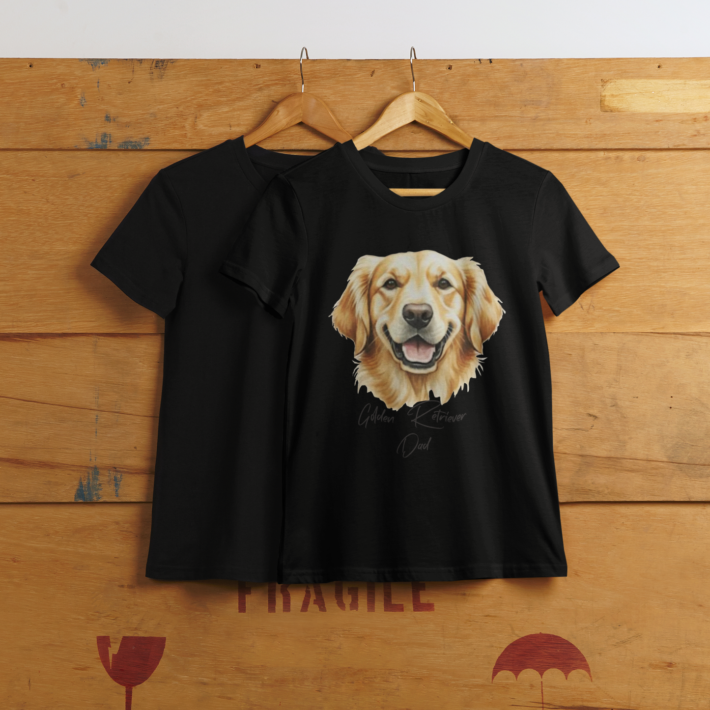 Black t-shirt with a dog graphic on a wooden surface