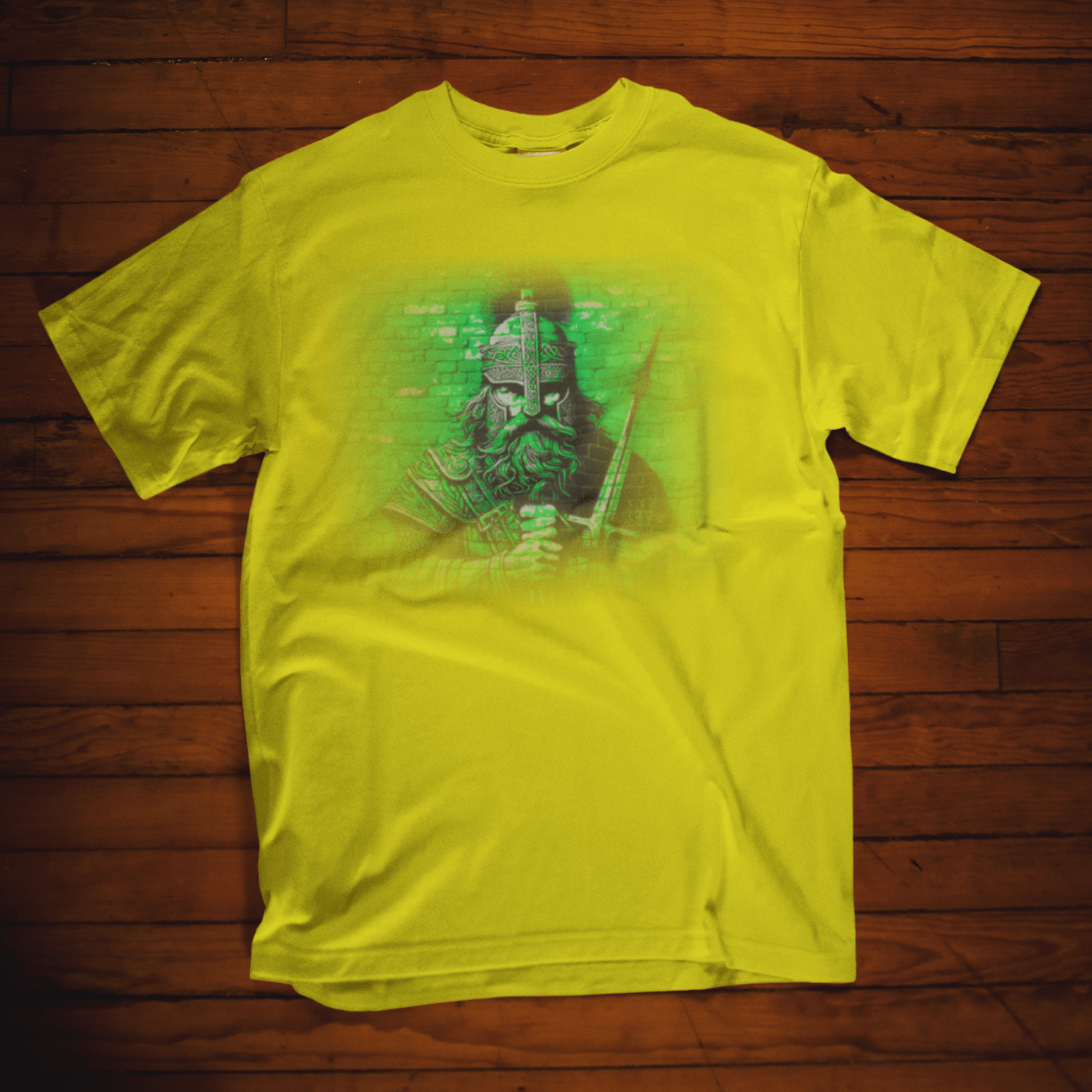 Graphic T-shirt depicting a Celtic warrior in traditional attire, wielding weapons and standing proudly against a dramatic backdrop.