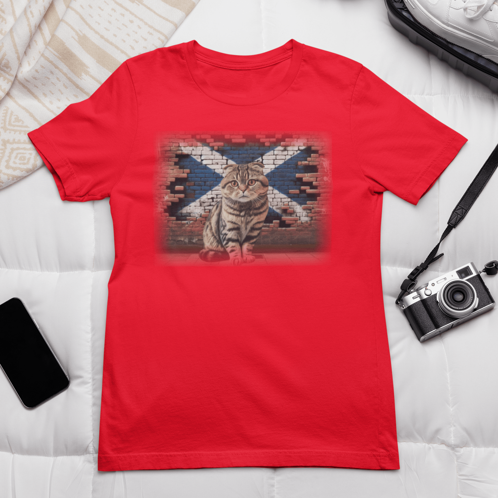 A Scottish Fold cat on a t-shirt, reminding you to "Shake it off" because it's too cute to resist.