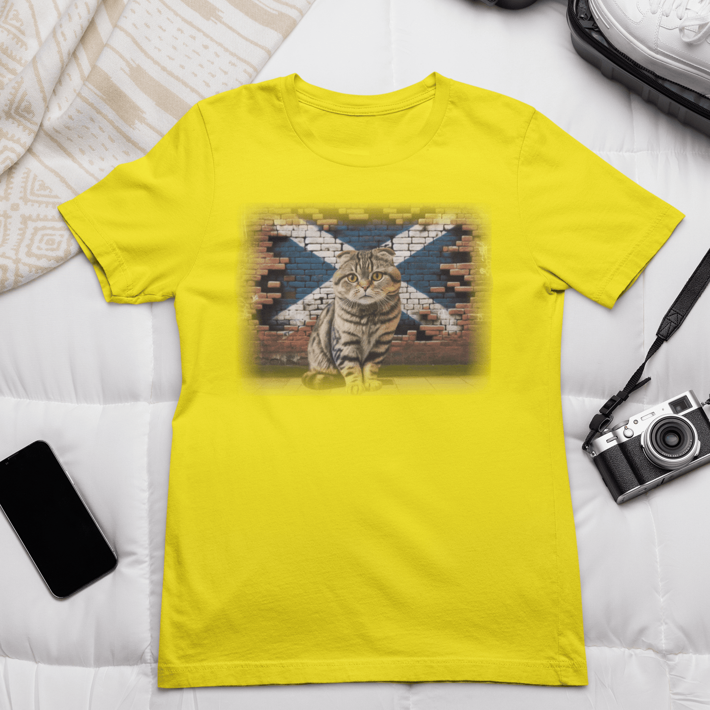 A Scottish Fold cat on a t-shirt, reminding you to "Shake it off" because it's too cute to resist.