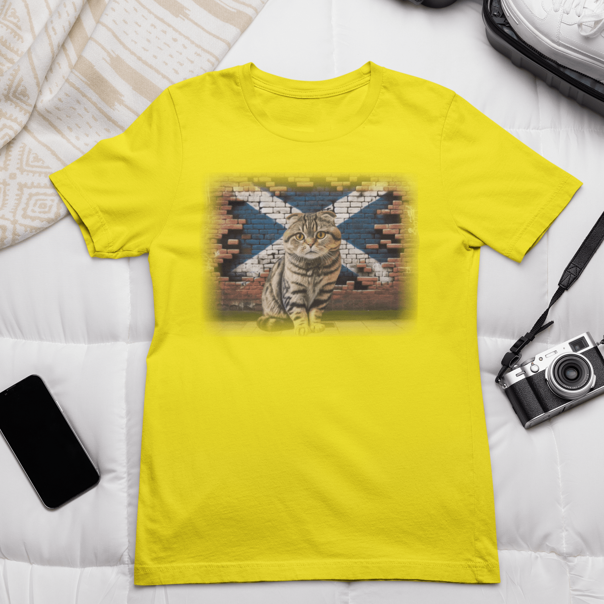 A Scottish Fold cat on a t-shirt, reminding you to "Shake it off" because it's too cute to resist.