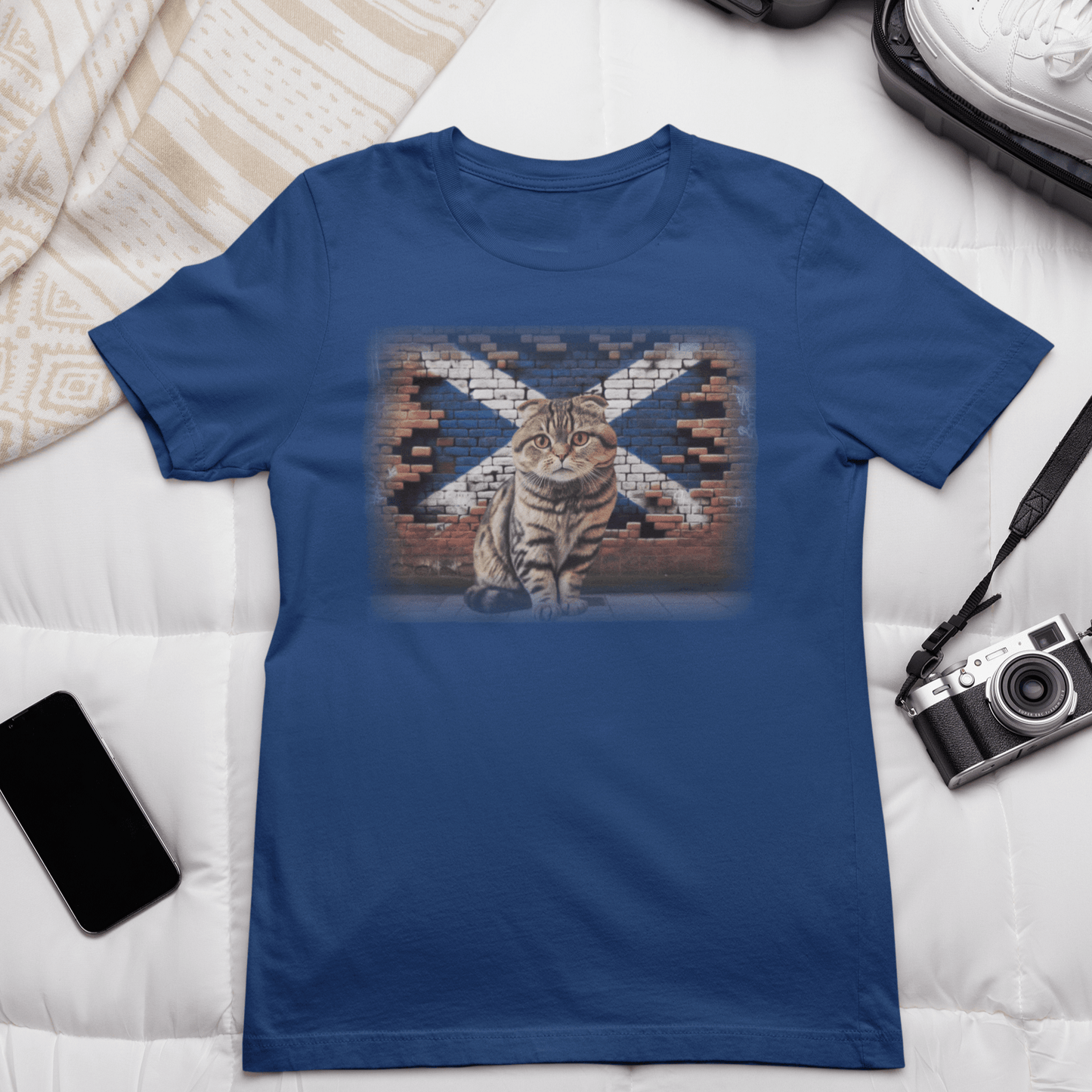 A Scottish Fold cat on a t-shirt, reminding you to "Shake it off" because it's too cute to resist.