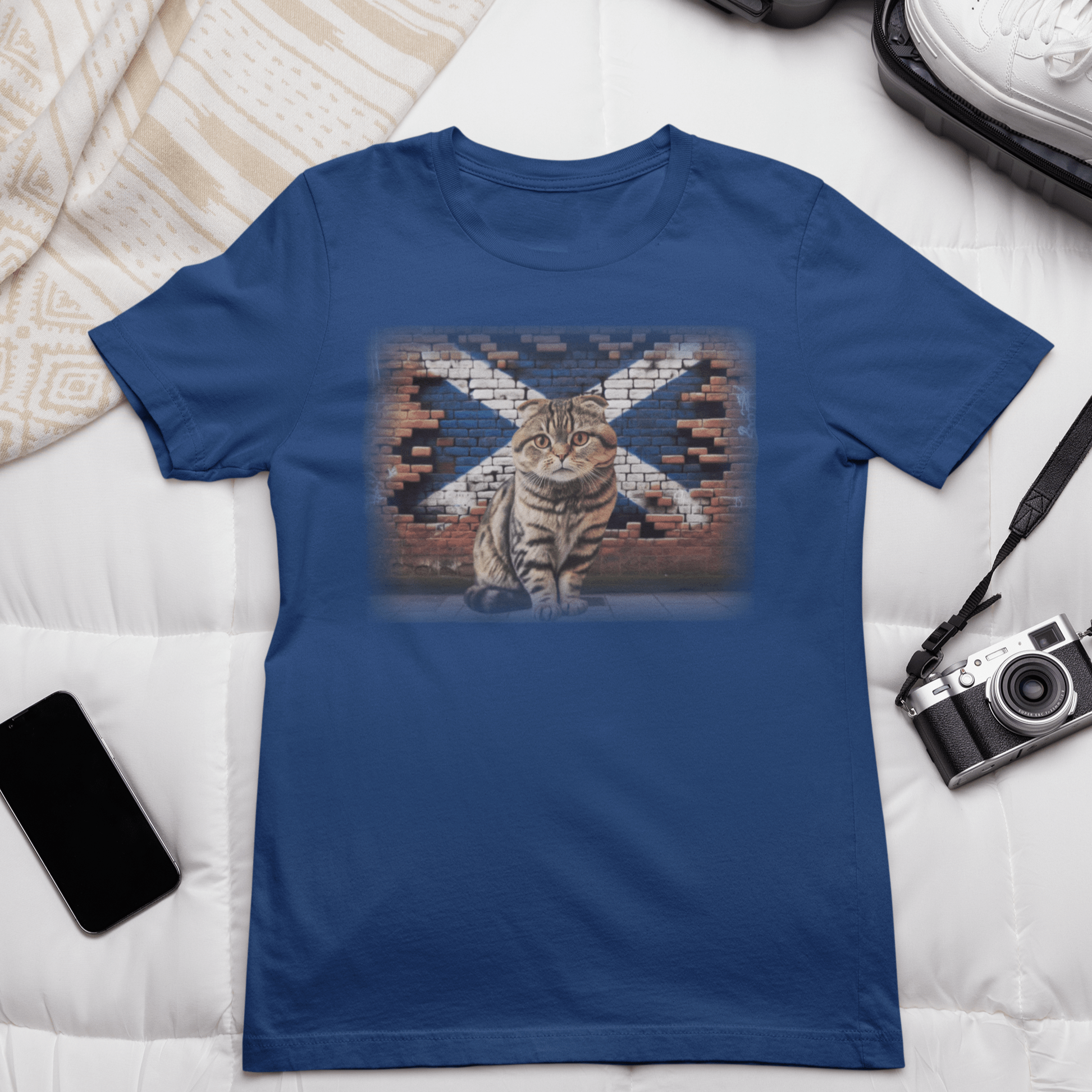 A Scottish Fold cat on a t-shirt, reminding you to "Shake it off" because it's too cute to resist.