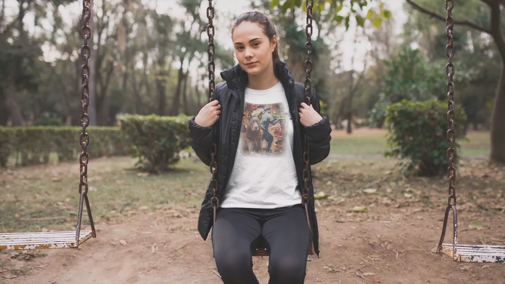 A baseball tee featuring a graphic image of a Kelpie dog.