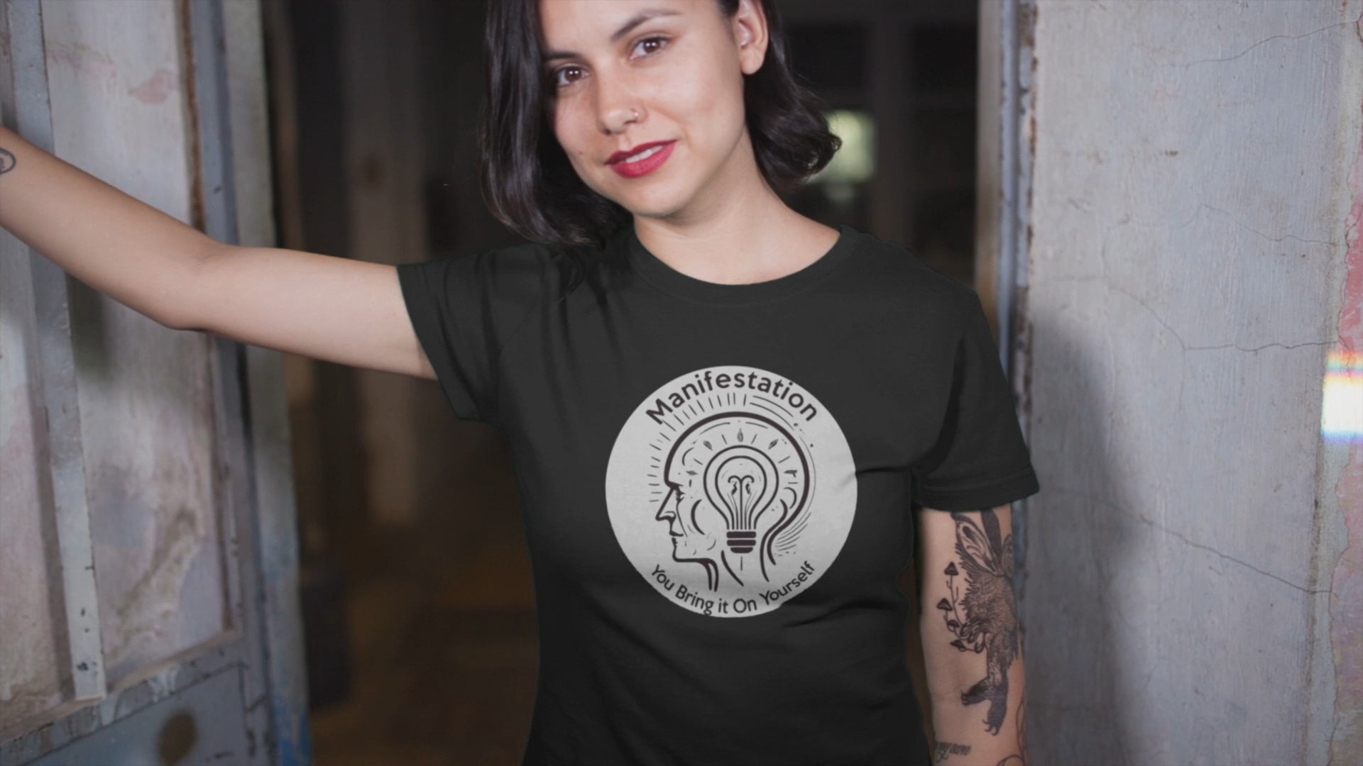 Graphic T-shirt promoting manifestation and mindfulness, with symbolic imagery or text related to personal growth and positivity.