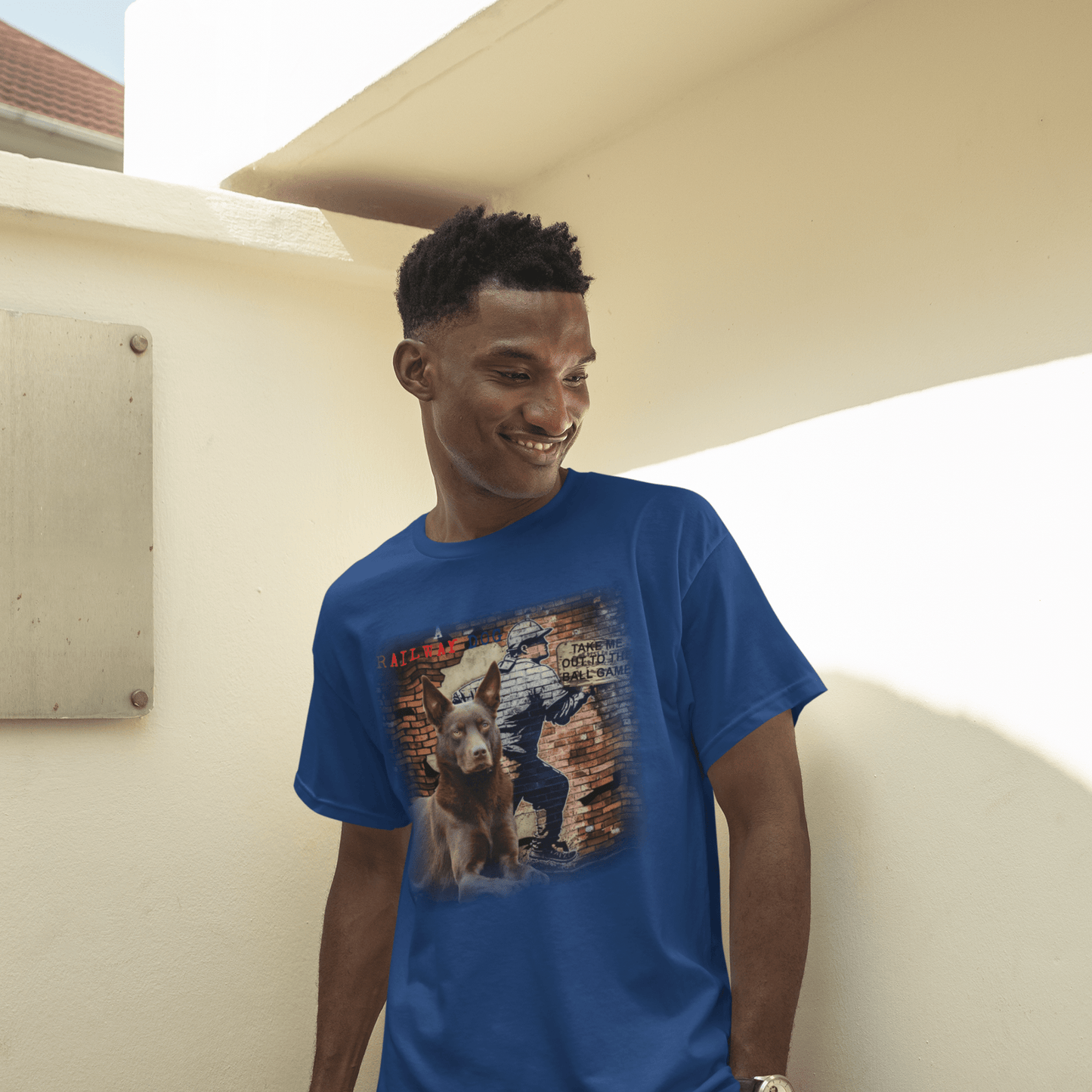A baseball tee featuring a graphic image of a Kelpie dog.