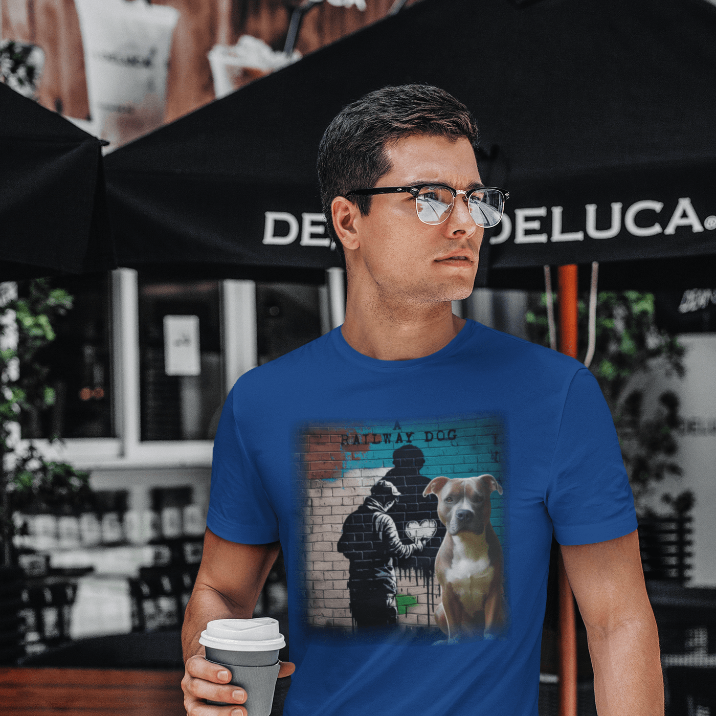 A Pitbull Terrier dog, a breed known for its loyalty and strength, featured on a t-shirt.