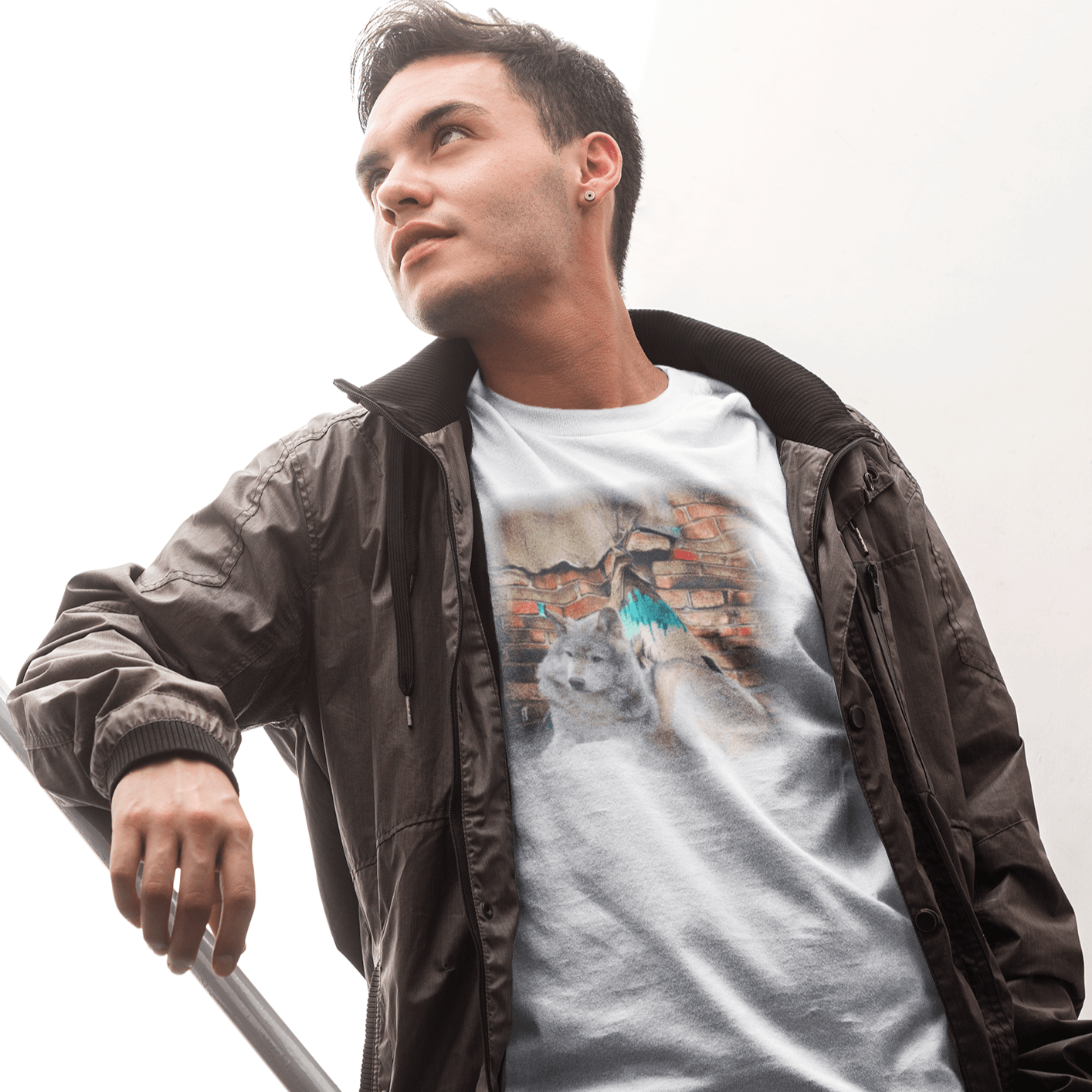 T-shirt featuring a graphic design of wolves and a message about wisdom, inspired by the wild.