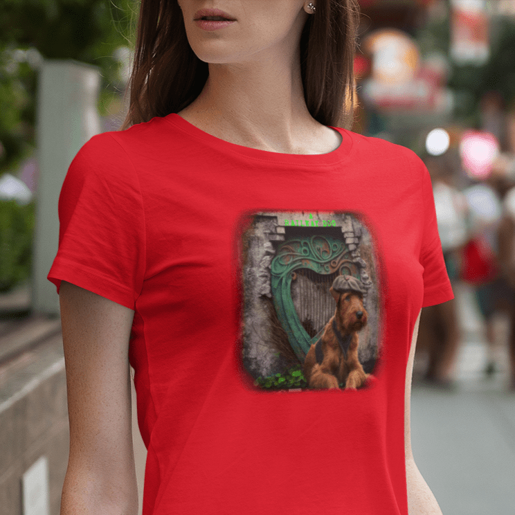 A lively Irish Terrier, known for its spirited personality and distinctive red coat, featured on a t-shirt.
