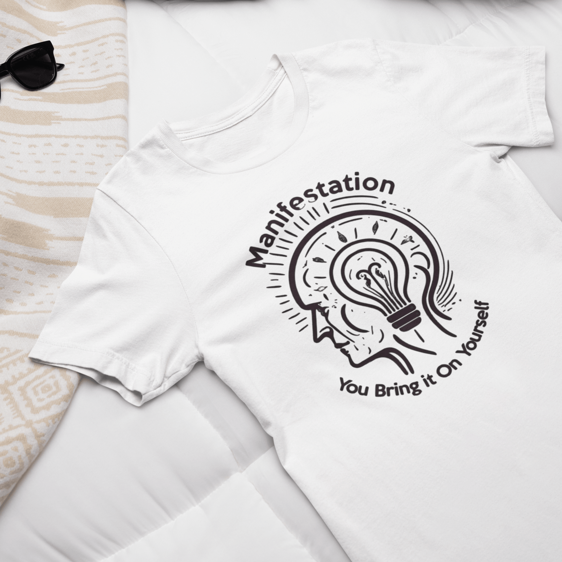 Graphic T-shirt promoting manifestation and mindfulness, with symbolic imagery or text related to personal growth and positivity.