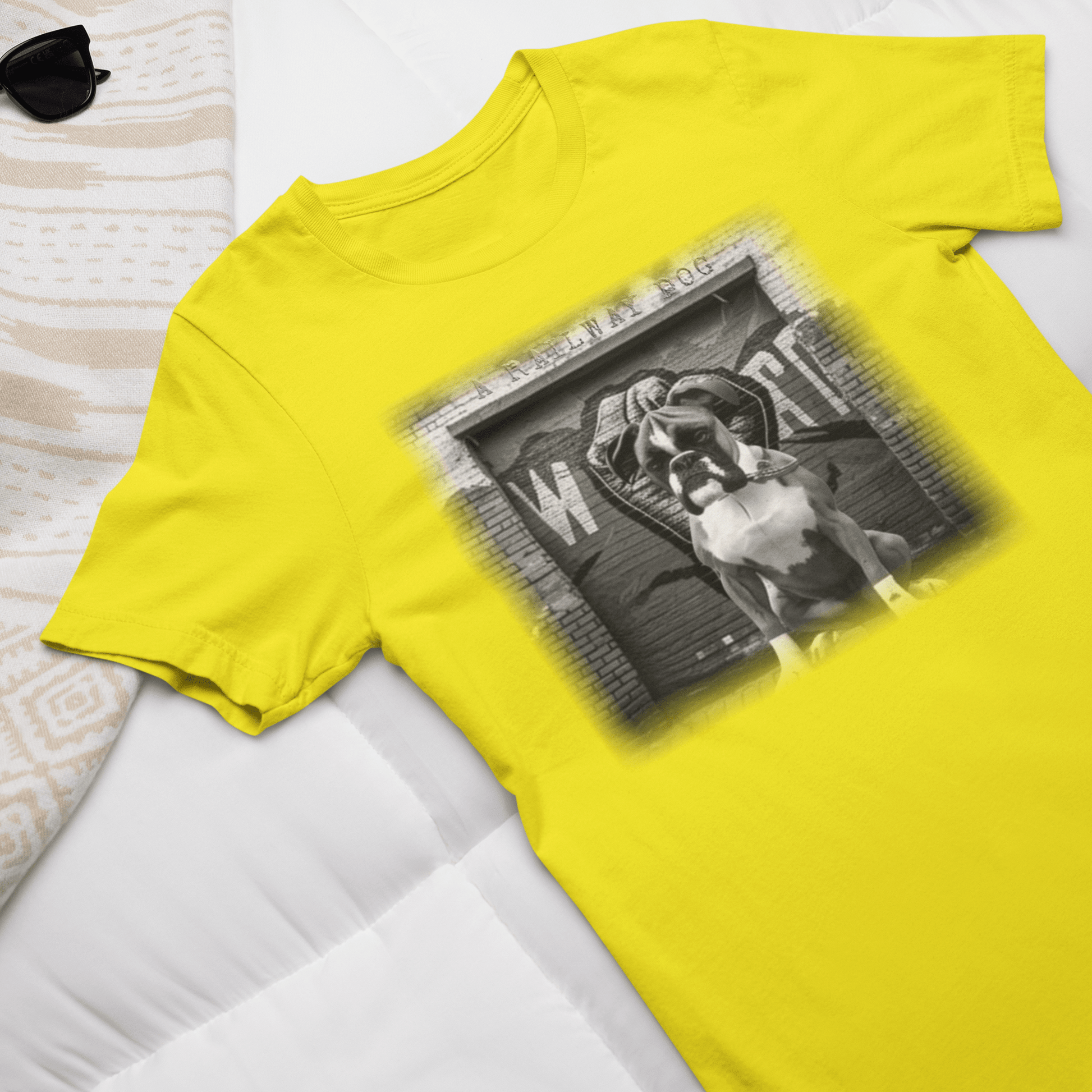 Image of a Boxer dog with a powerful build and energetic expression on a t-shirt.