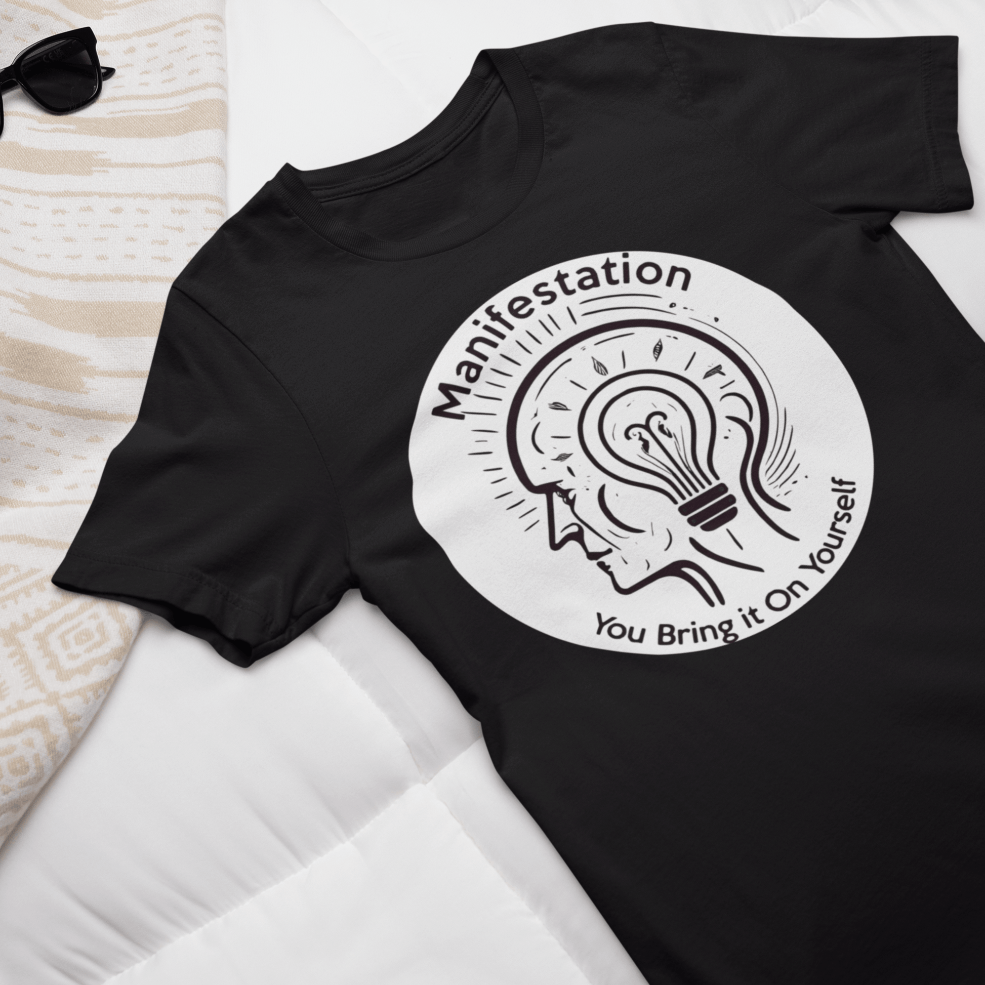 Graphic T-shirt promoting manifestation and mindfulness, with symbolic imagery or text related to personal growth and positivity.