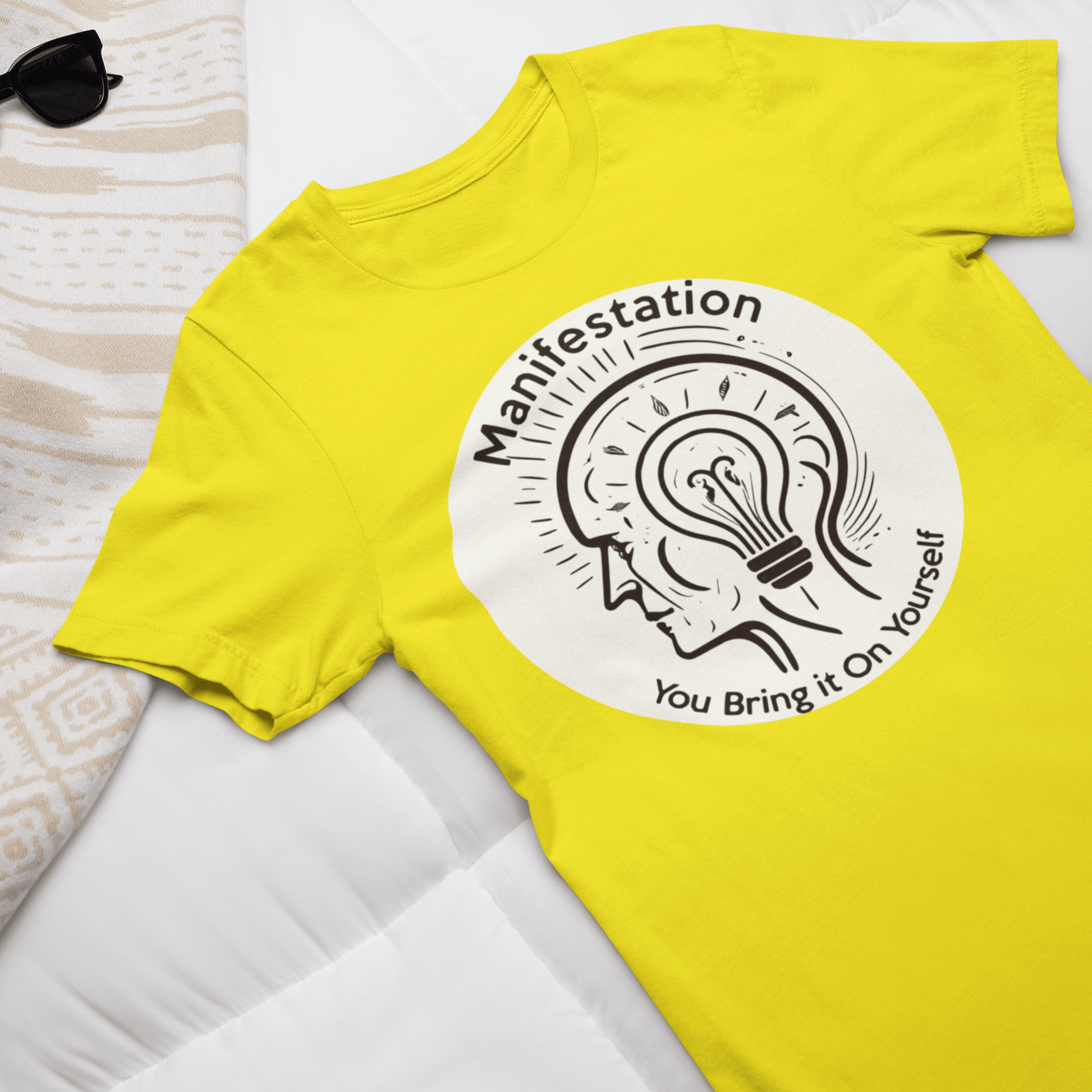 Graphic T-shirt promoting manifestation and mindfulness, with symbolic imagery or text related to personal growth and positivity.