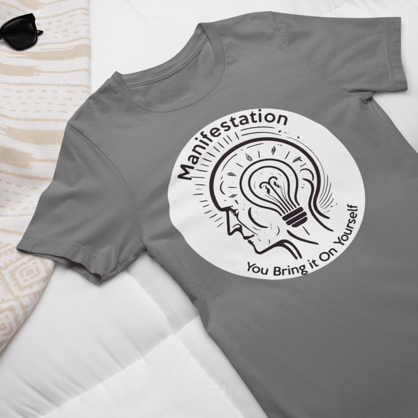 Graphic T-shirt promoting manifestation and mindfulness, with symbolic imagery or text related to personal growth and positivity.