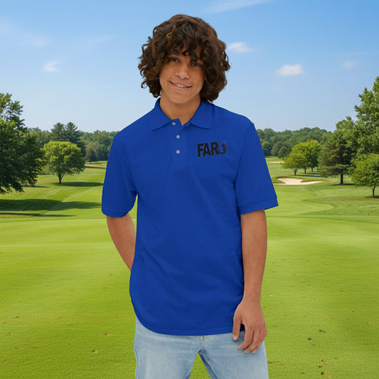 Child wearing a blue polo shirt with 'FARQ' logo on a white background