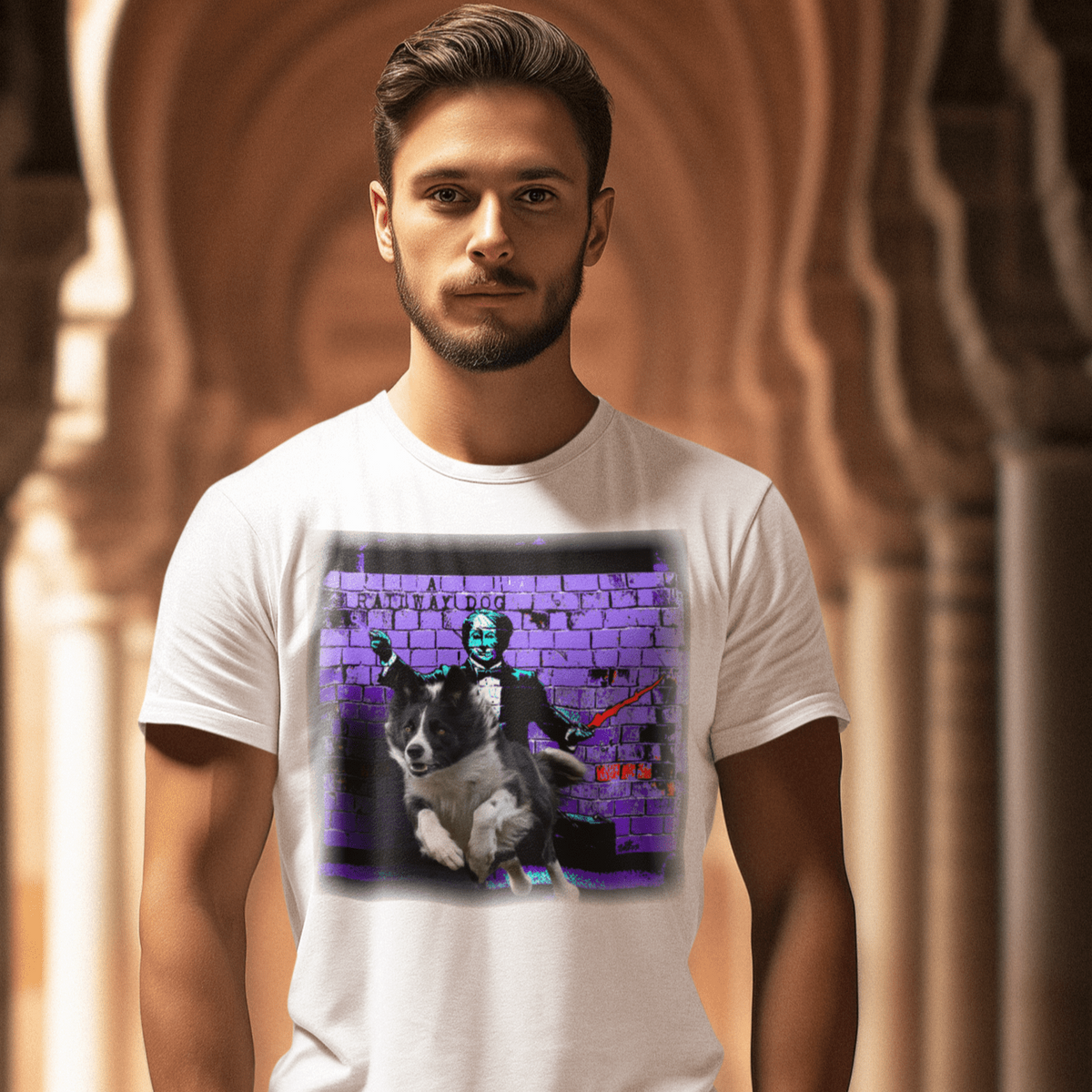 graphic t-shirt featuring a Border Collie leaping forward from a stage Conductor mural against a purple brick wall with "A Railway Dog" text.
