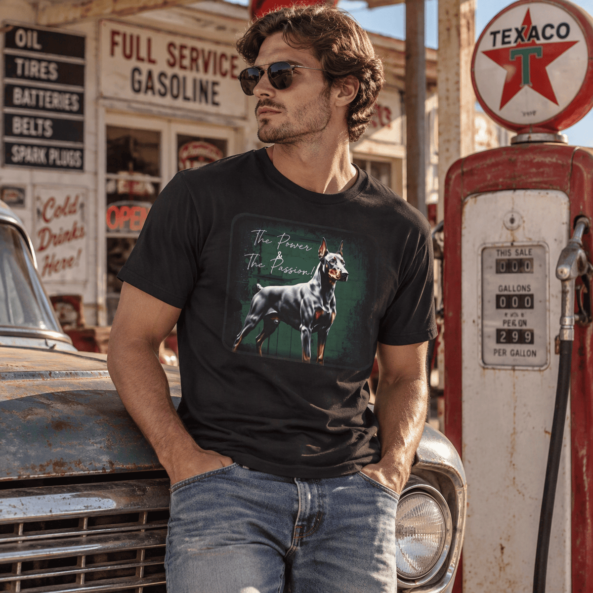 Man wearing a black t-shirt with a Doberman dog graphic and text, standing