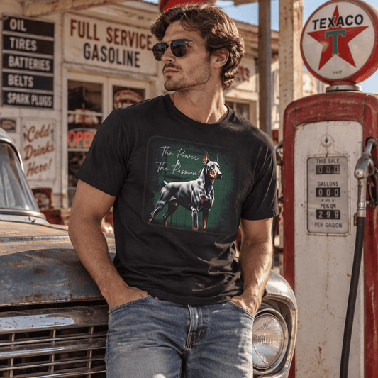 Man wearing a black t-shirt with a Doberman dog graphic and text, standing