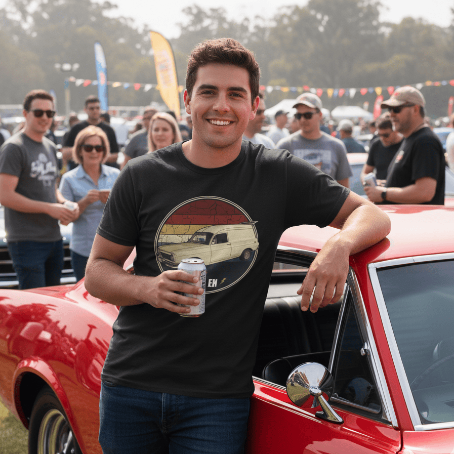 Man standing wearing an EH Holden t-shirt holding a can, with a crowd and cars in the background