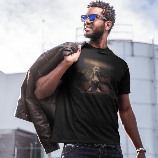 graphic t-shirt featuring an American Staffordshire Terrier seated in a rustic setting with typewriter text reading "A Railway Dog."