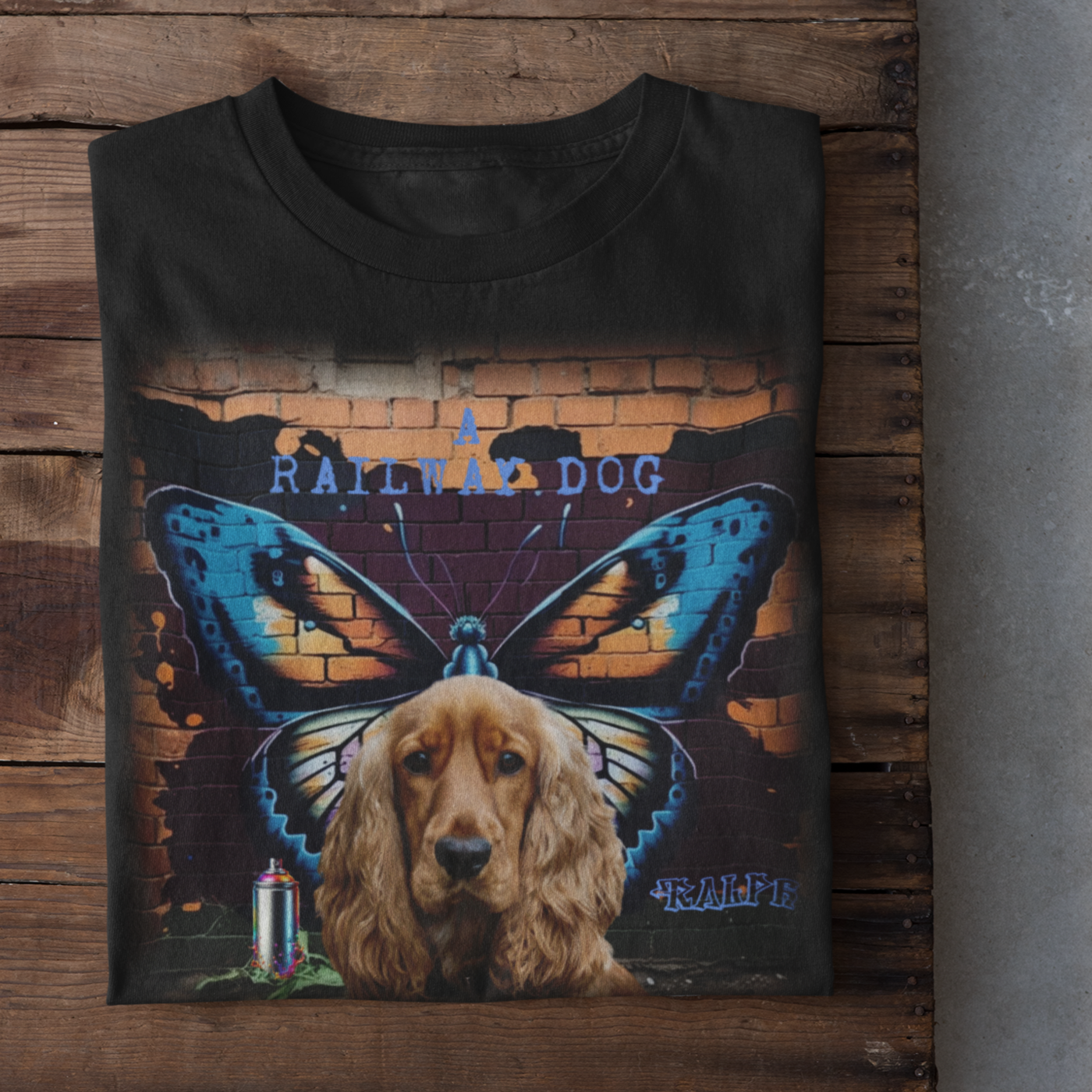 A t-shirt with a graphic design featuring a Cocker Spaniel dog and a butterfly