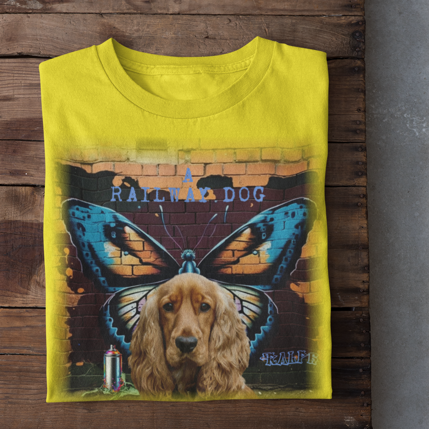 A t-shirt with a graphic design featuring a Cocker Spaniel dog and a butterfly