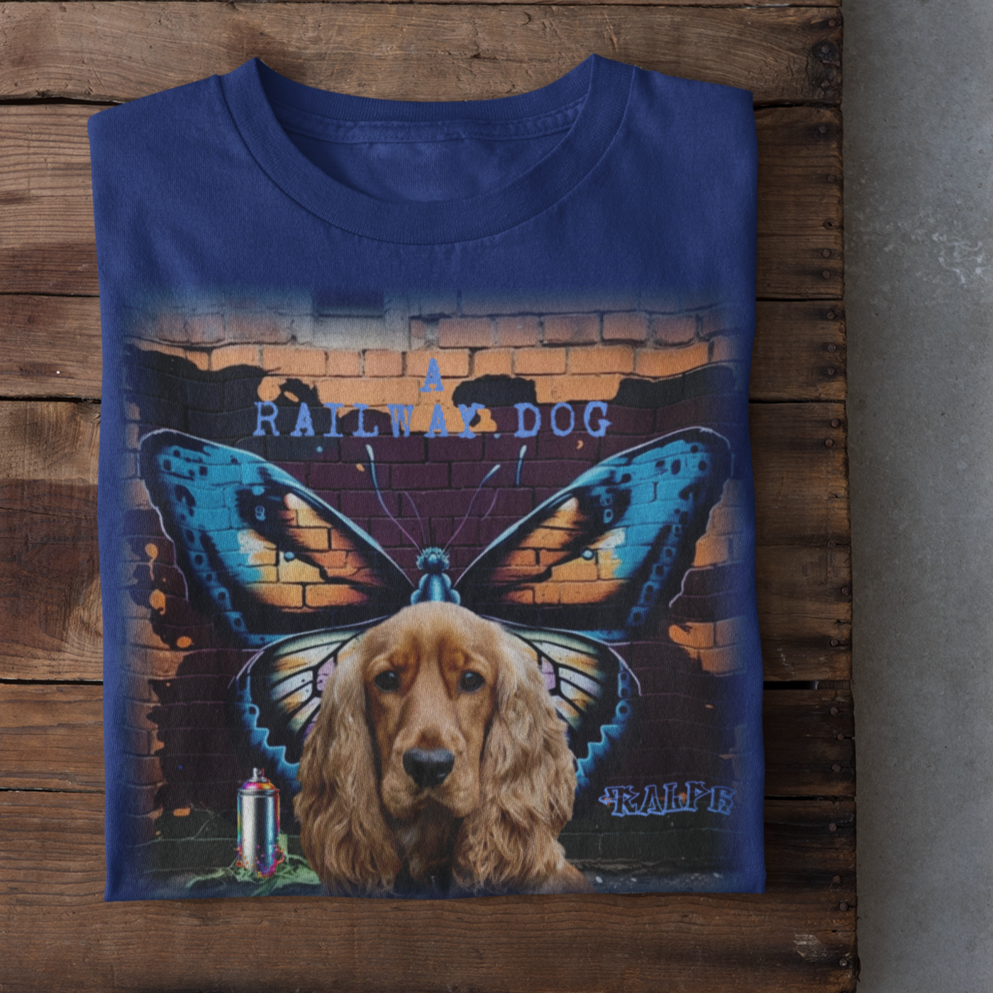 A t-shirt with a graphic design featuring a Cocker Spaniel dog and a butterfly