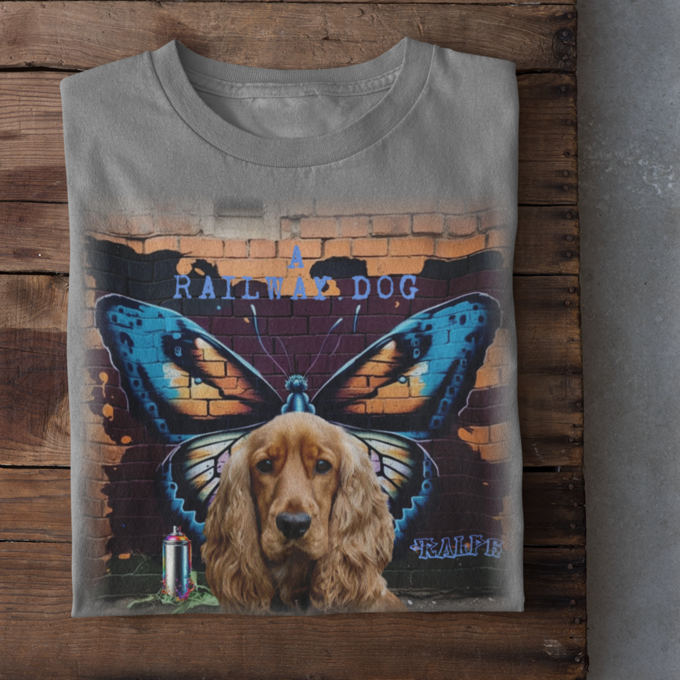 A t-shirt with a graphic design featuring a Cocker Spaniel dog and a butterfly