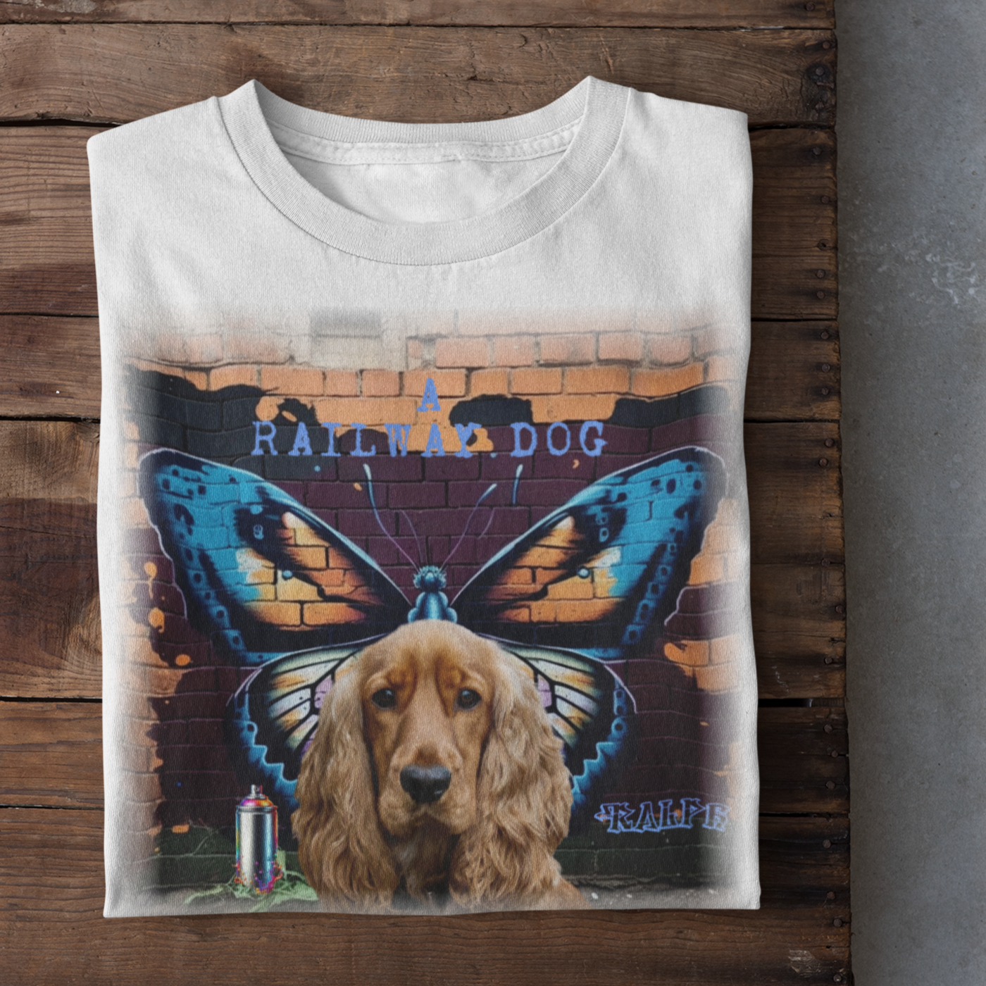 A t-shirt with a graphic design featuring a Cocker Spaniel dog and a butterfly