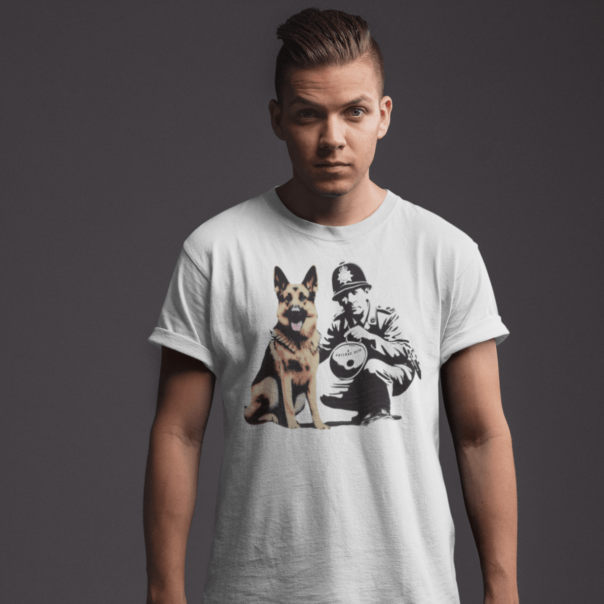 A male model wearing a white t-shirt with a black and white German Shepherd dog graphic and the text 'Urban K-9'.