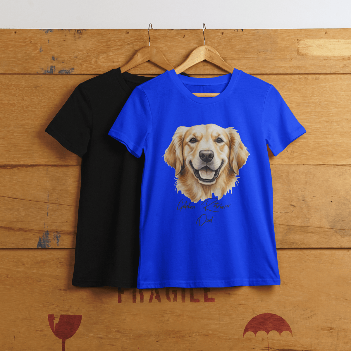blue t-shirts with Golden Retriever graphic on a wooden background